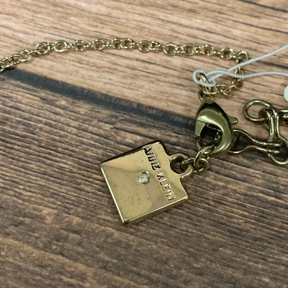 Anne Klein gold tone